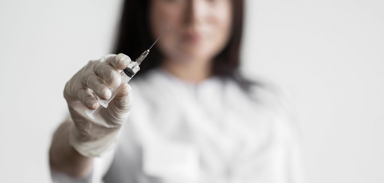 doctor-preparing-medical-vaccine doctor-preparing-medical-vaccine