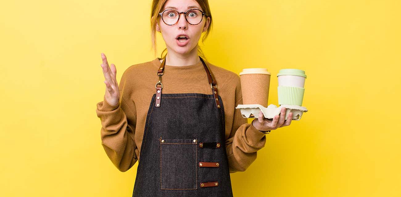 Woman Surprise Holding 2 Cups of Coffee