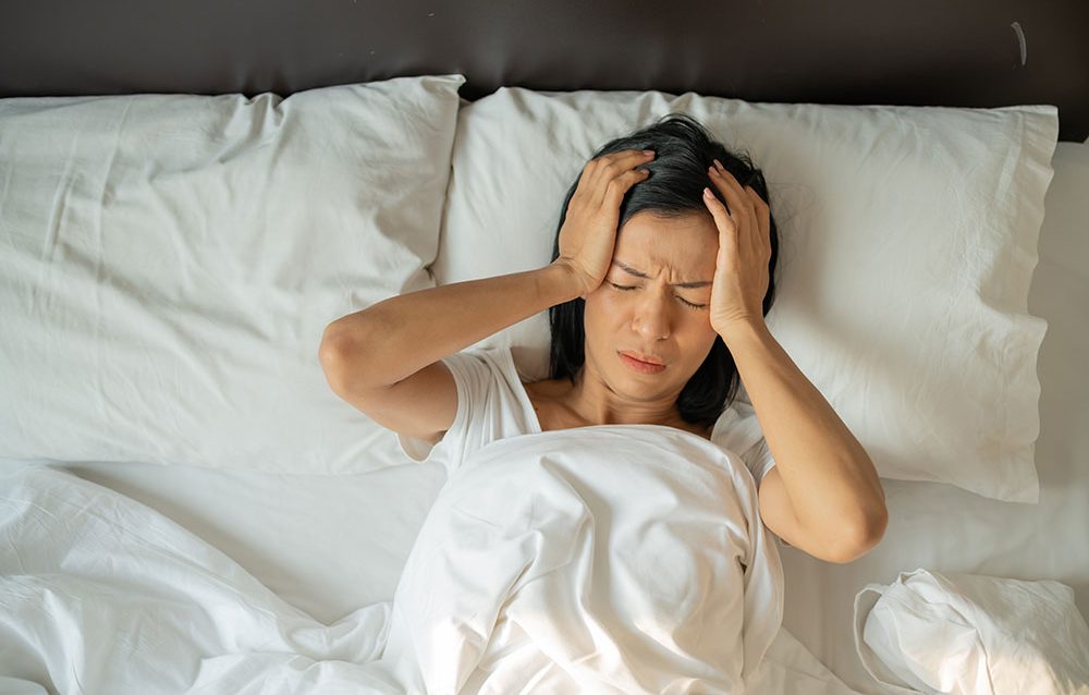 Woman Un Happy Lies in Bed Awake Due to Insomnia
