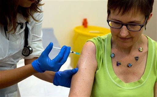 Experimental Ebola Vaccine | Lady Getting Shot for Ebola