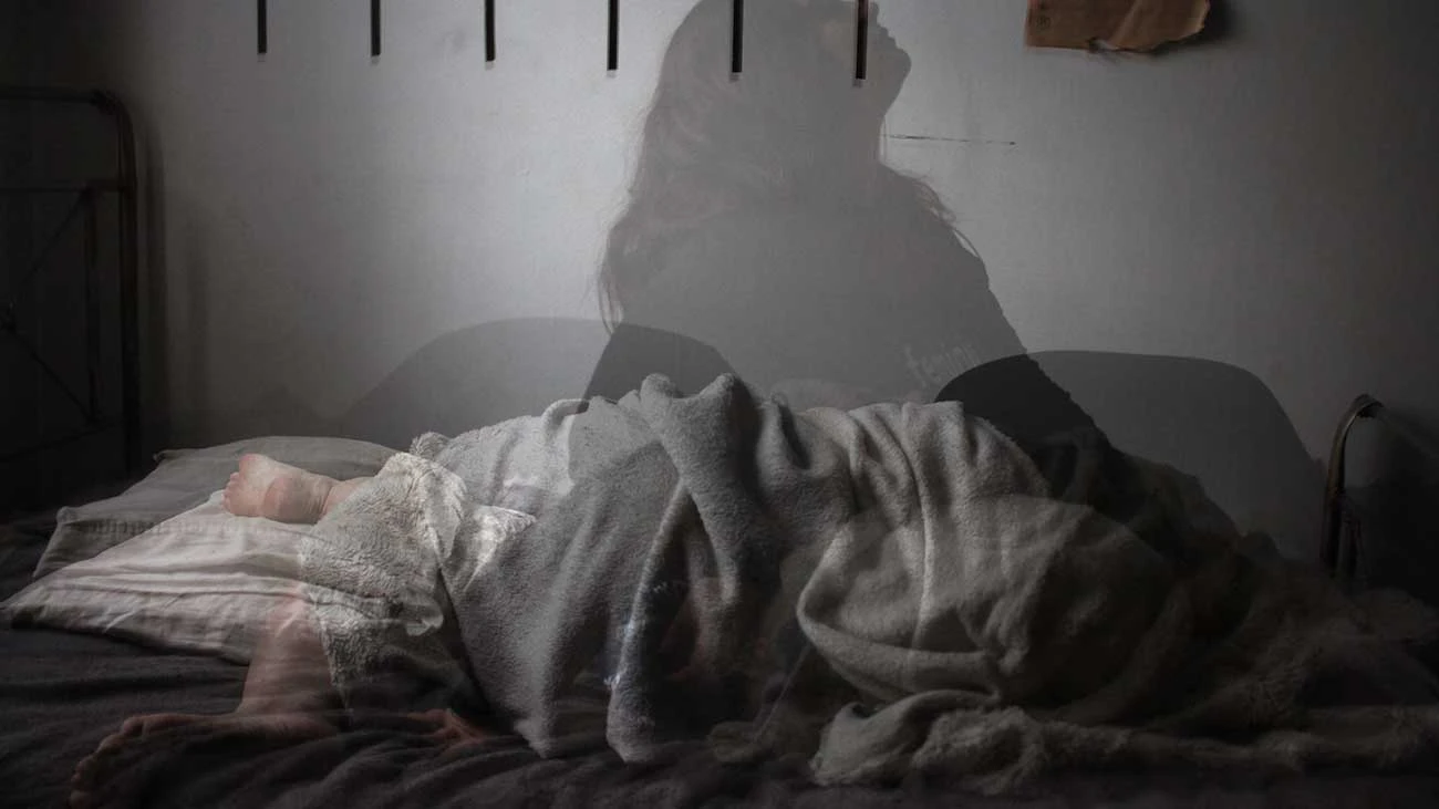 Insomnia and Depression Relationship and Effects Image of Person Restless Sleep