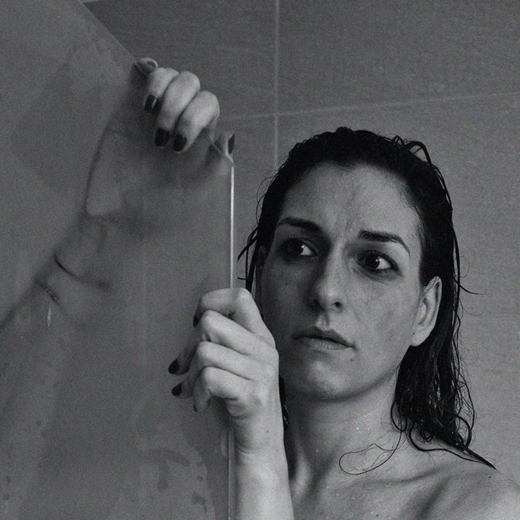 Woman with Anxiety Taking Shower to Help Calm Herself Down